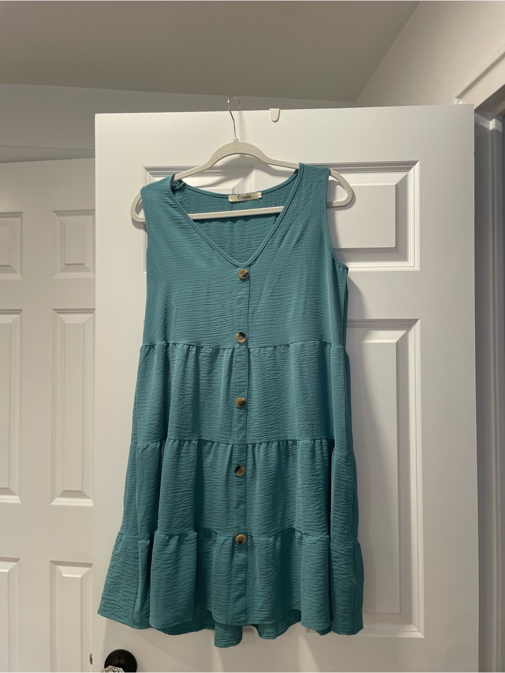Sleeveless Tiered Mini Dress in Teal with Button Front